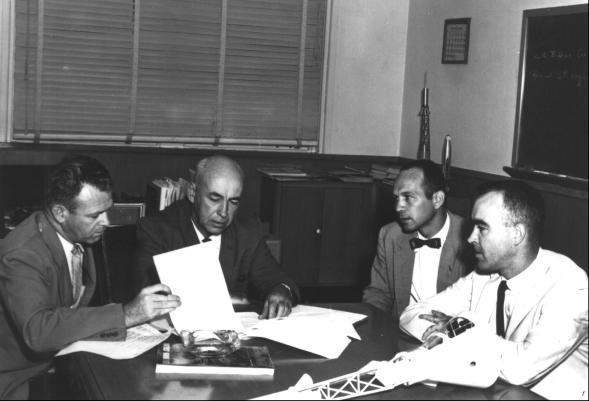 [Gilruth and aides discuss Apollo]