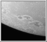 Dark Areas on Triton